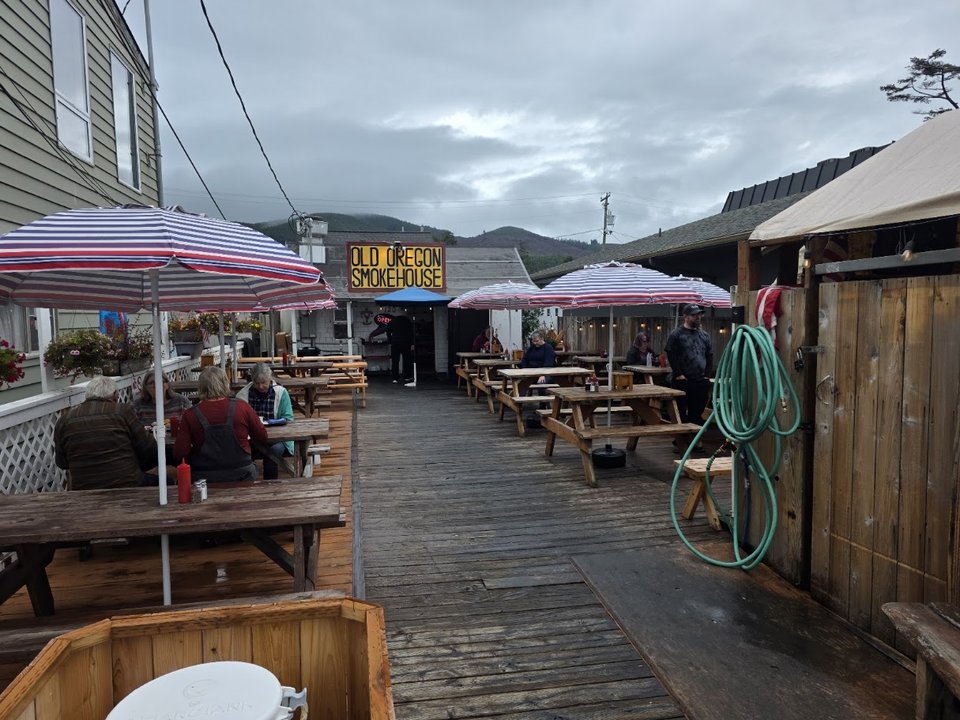 Compact patio seating beside the restaurant.